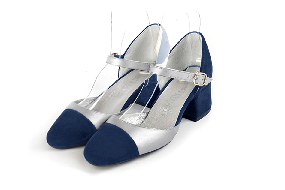 Navy blue and silver open side elegant shoes, with an instep strap. Round toe. Low flare heels.